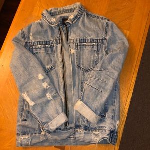 Super distressed denim jacket